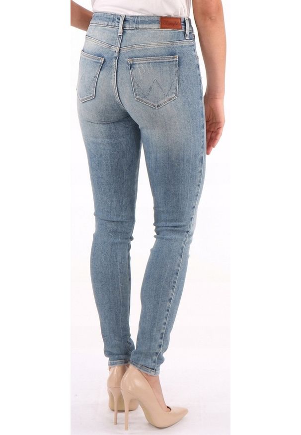 Wrangler - WRANGLER SKINNY DAMSKIE SPODNIE JEANSOWE ALL SHE WANTS W28KCZ99J