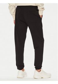 Tommy Jeans Spodnie dresowe Dna Graphic DM0DM22145 Czarny Slim Fit. Kolor: czarny. Materiał: bawełna #4