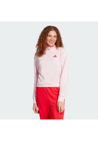 Adidas - Bluza dresowa Essentials Color Pop French Terry Crop Quarter-Zip. Kolor: różowy. Materiał: dresówka. Długość rękawa: długi rękaw. Długość: krótkie. Sport: fitness