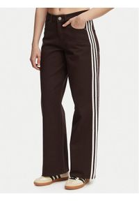 Adidas - adidas Jeansy Firebird KD2934 Brązowy Loose Fit. Kolor: brązowy #1