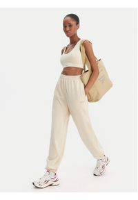 Reebok Spodnie dresowe Reebok x Ewa Chodakowska Ada RK25621CCW Beżowy Relaxed Fit. Kolor: beżowy. Materiał: syntetyk #3