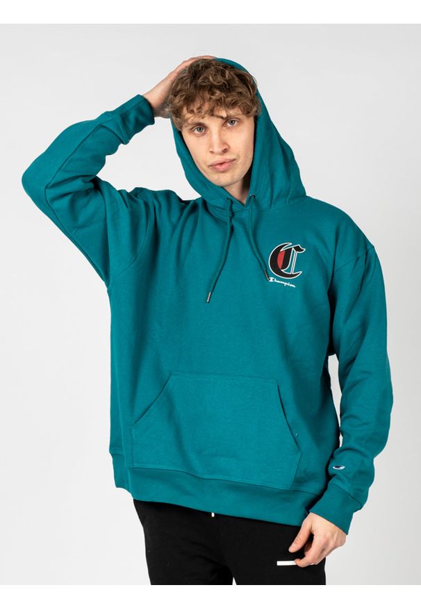 Champion Bluza "Hoodie" | HBGF89H586NKA | Mężczyzna | Turkusowy. Okazja: na co dzień. Typ kołnierza: kaptur. Kolor: turkusowy. Materiał: bawełna, poliester. Wzór: nadruk, aplikacja. Styl: casual