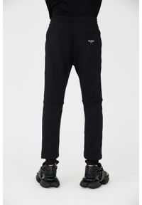 Balmain - BALMAIN Czarne męskie spodnie dresowe Ribbed Flock Sweatpants, Rozmiar L. Kolor: czarny. Materiał: dresówka #3