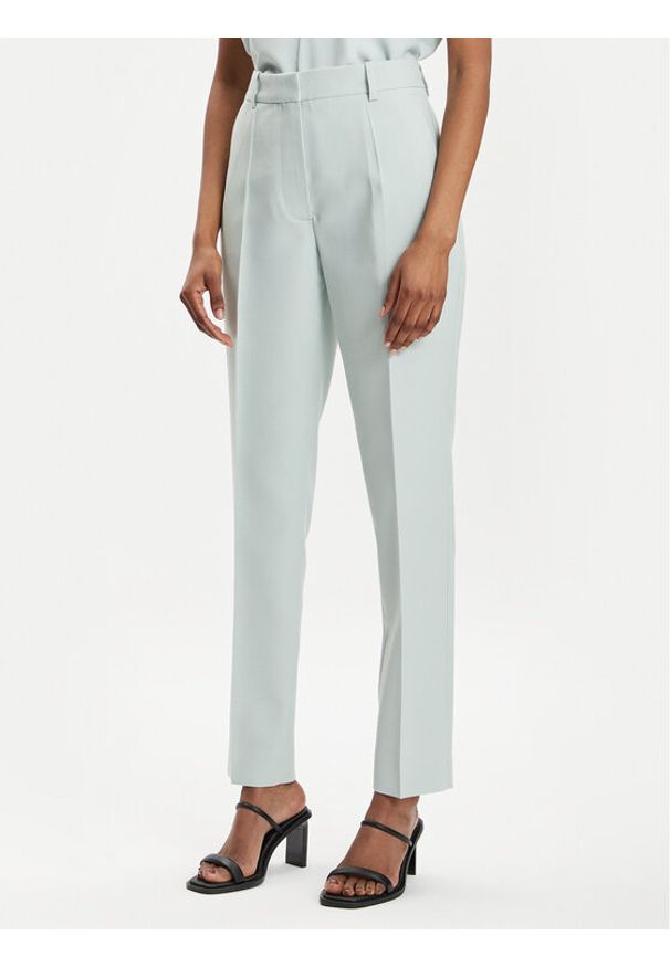 Calvin Klein Chinosy K20K205959 Zielony Slim Fit. Kolor: zielony. Materiał: wiskoza, syntetyk