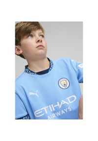 Puma - Młodzieżowa koszulka domowa Manchester City 24/25 PUMA Team Light Blue Marine. Kolor: niebieski