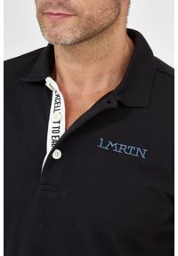La Martina - LA MARTINA Czarna koszulka polo. Typ kołnierza: polo. Kolor: czarny. Materiał: jersey