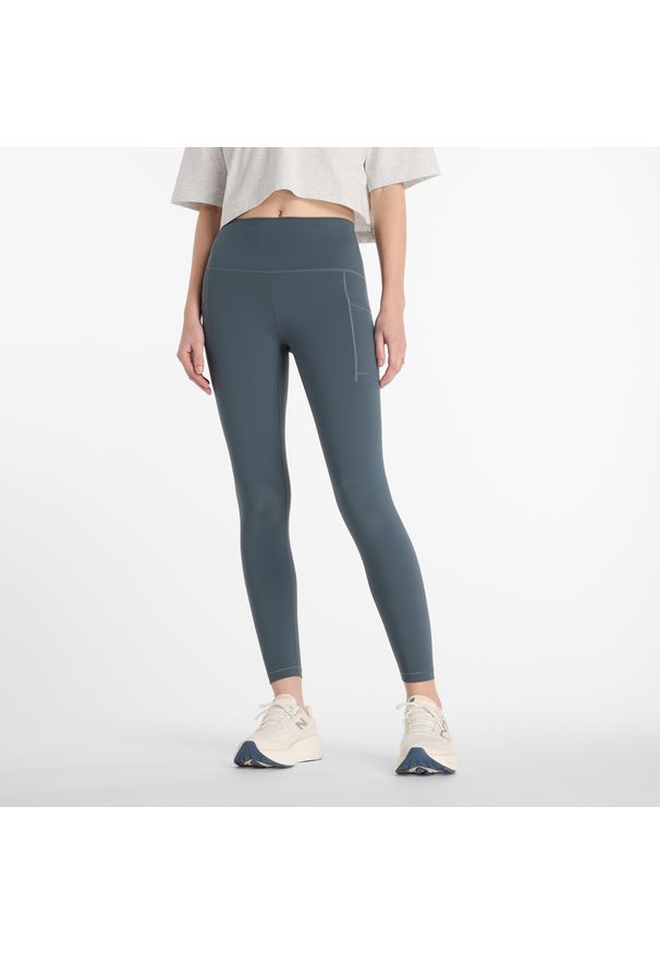 Legginsy damskie do biegania New Balance Sleek WP51268GT – szare. Stan: podwyższony. Kolor: szary. Materiał: lycra, poliester, materiał. Wzór: gładki. Sport: fitness