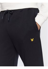 Lyle & Scott Spodnie dresowe Fly TR1484SPTR Granatowy Slim Fit. Kolor: niebieski. Materiał: syntetyk, dresówka