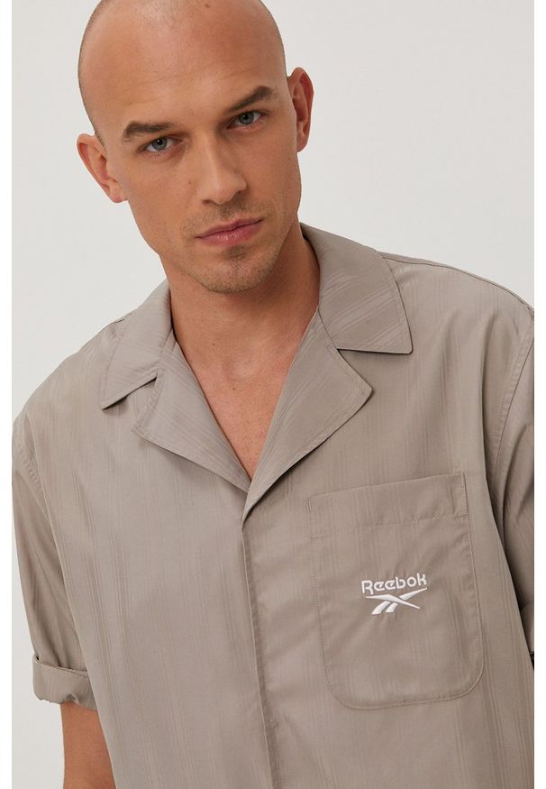 Reebok Classic - Koszula. Okazja: na co dzień. Kolor: szary. Materiał: tkanina, poliester. Długość rękawa: krótki rękaw. Długość: krótkie. Styl: casual