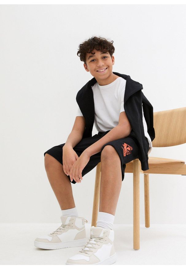 bonprix - Bermudy dresowe chłopięce z bawełny organicznej. Kolor: czarny. Materiał: bawełna, dresówka