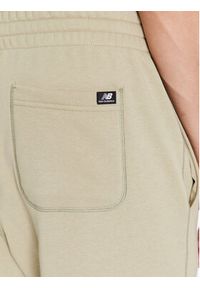 New Balance Spodnie dresowe NB Essentials Sweatpant MP33509 Zielony Regular Fit. Kolor: zielony. Materiał: syntetyk #3
