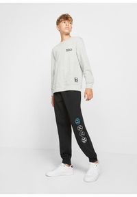 bonprix - Spodnie dresowe z miękkiej mieszanki bawełny. Kolor: czarny. Materiał: bawełna, dresówka. Wzór: nadruk #3