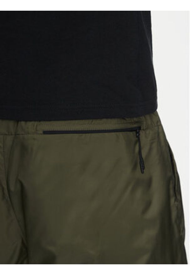 Nike Spodnie dresowe FB7911 Khaki Regular Fit. Kolor: brązowy. Materiał: syntetyk