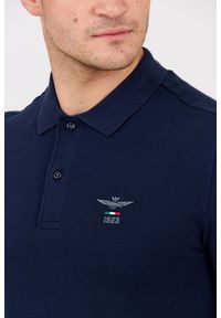 Aeronautica Militare - AERONAUTICA MILITARE Granatowy męski longsleeve polo. Typ kołnierza: polo. Kolor: niebieski. Materiał: bawełna. Długość rękawa: długi rękaw. Długość: długie