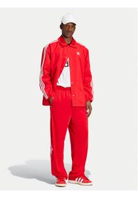 Adidas - adidas Spodnie dresowe Adibreak IY9924 Czerwony Loose Fit. Kolor: czerwony. Materiał: syntetyk