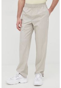 Rains spodnie 18700 Woven Pants Regular kolor zielony proste high waist. Stan: podwyższony. Kolor: zielony. Materiał: tkanina #6