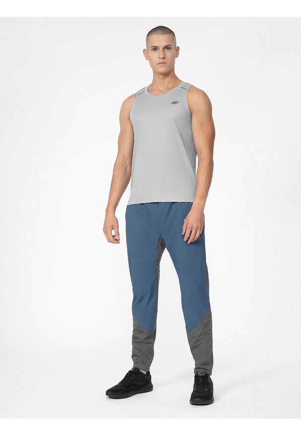 4f - Spodnie do biegania Ultralight męskie. Kolor: szary. Materiał: materiał, tkanina, guma. Sport: fitness, bieganie