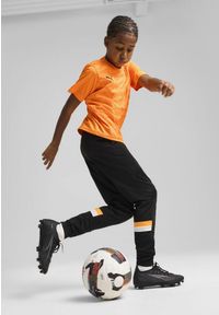 Puma - Młodzieżowa koszulka z grafiką individualFINAL PUMA Heat Fire Black Orange. Kolor: żółty, wielokolorowy, pomarańczowy, czarny