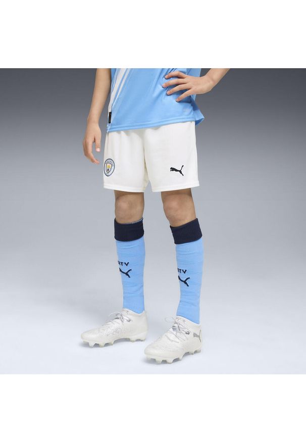 Puma - Młodzieżowe szorty Manchester City 25/26 PUMA White Team Light Blue. Kolor: niebieski, wielokolorowy, biały. Materiał: tkanina. Sport: piłka nożna