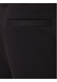 Hugo - HUGO Spodnie dresowe Nyrotro 50549779 Czarny Loose Fit. Kolor: czarny. Materiał: bawełna #3