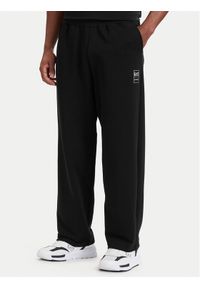 EA7 Emporio Armani Spodnie dresowe 7M002111 AF27201 UC001 Czarny Relaxed Fit. Kolor: czarny. Materiał: bawełna #1