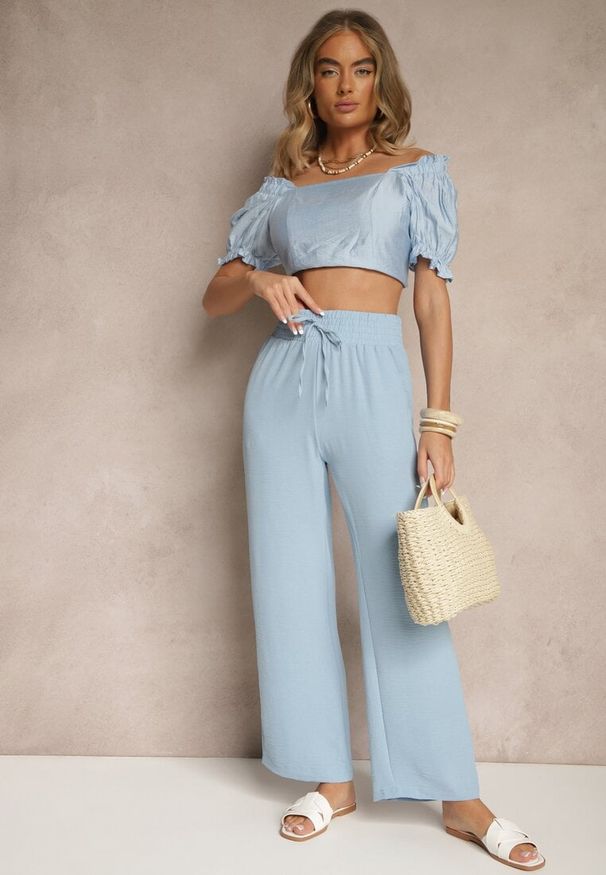 Renee - Jasnoniebieskie Szerokie Spodnie High Waist z Gumką w Pasie Savimirae. Okazja: na co dzień. Stan: podwyższony. Kolor: niebieski. Styl: casual, elegancki