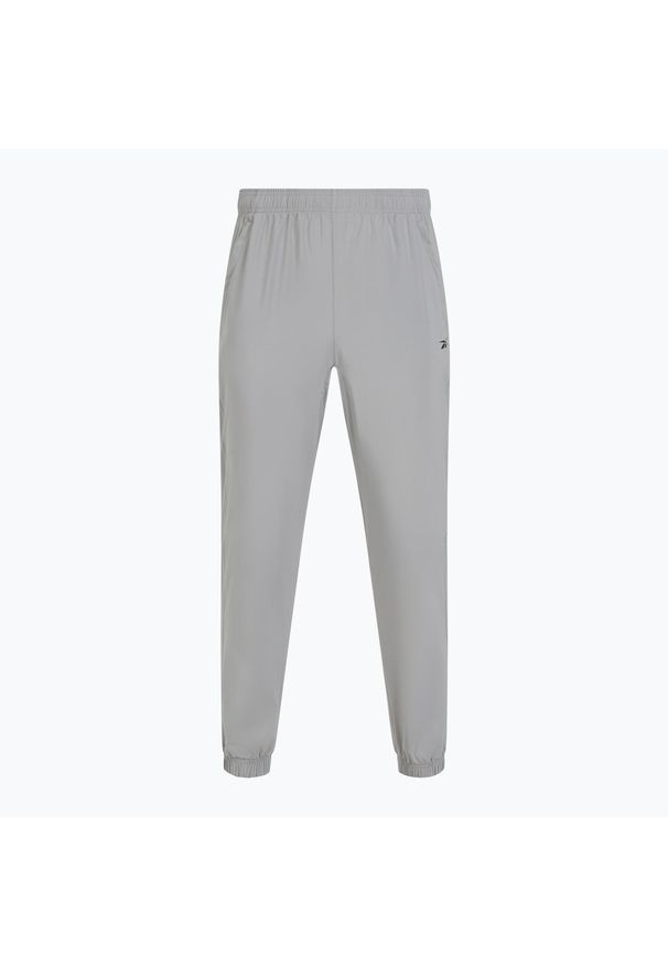 Reebok Fitness - Spodnie męskie Reebok Id Train Woven. Kolor: szary. Sport: fitness