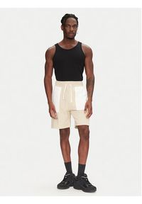 The North Face Szorty sportowe Terry NF0A8C29 Beżowy Regular Fit. Kolor: beżowy. Materiał: bawełna, syntetyk. Styl: sportowy #6