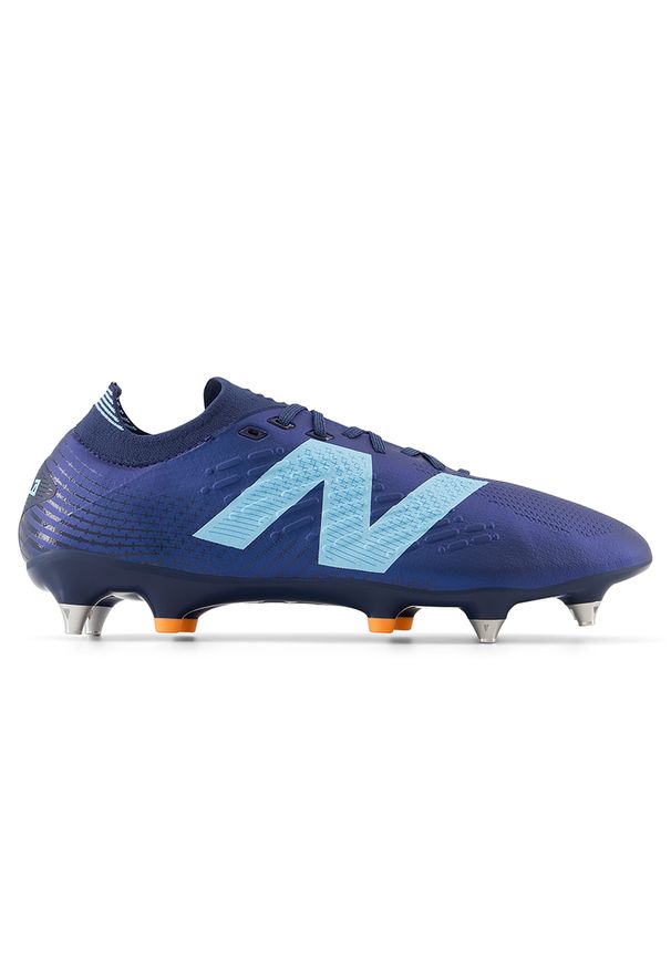 Korki męskie New Balance TEKELA PRO SG V4+ ST1SLN45 – granatowe. Kolor: niebieski. Materiał: włókno, materiał, nylon, guma. Szerokość cholewki: normalna. Sport: bieganie
