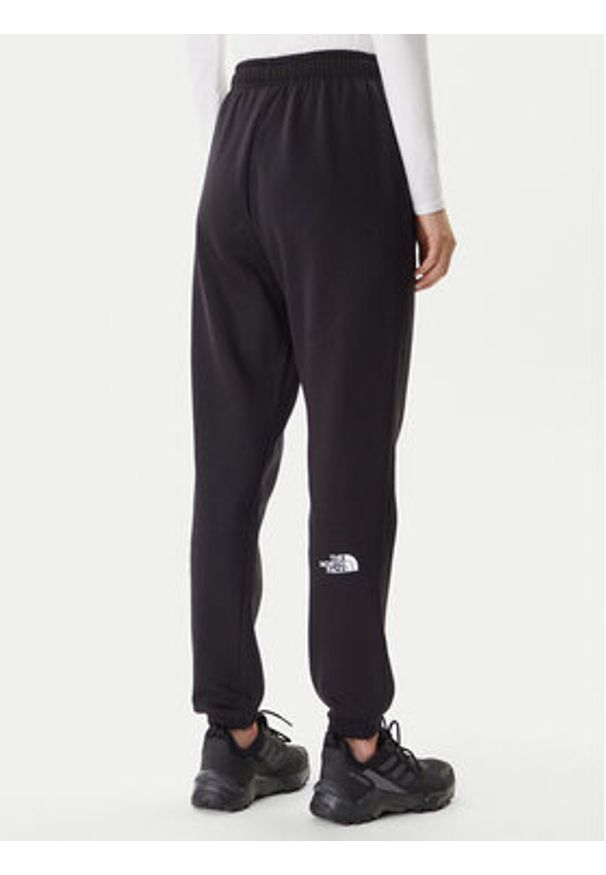 The North Face Spodnie dresowe Simple Dome NF0A8C1Y Czarny Regular Fit. Kolor: czarny. Materiał: syntetyk, bawełna