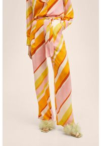 mango - Mango spodnie Odilia damskie kolor pomarańczowy szerokie high waist. Stan: podwyższony. Kolor: pomarańczowy