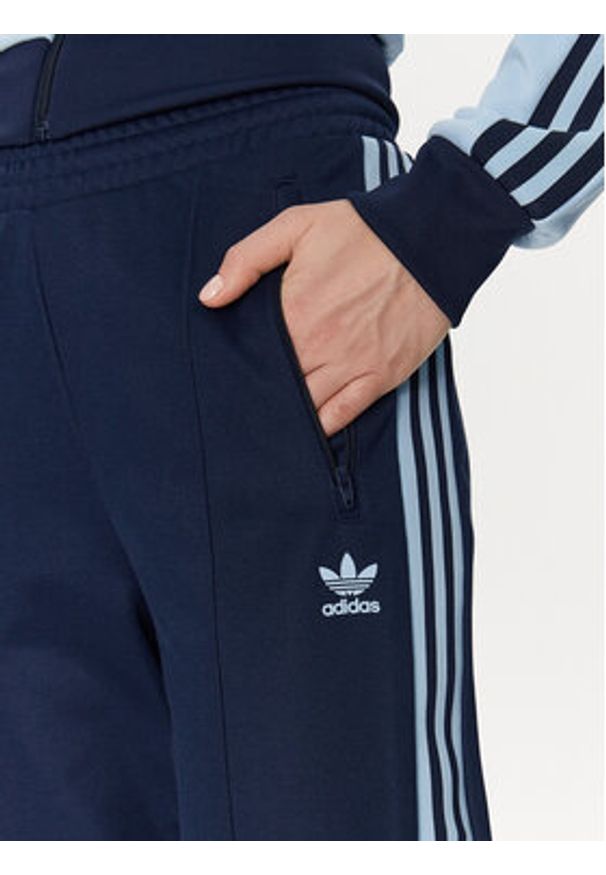 Adidas - adidas Spodnie dresowe Beckenbauer JC5793 Granatowy Regular Fit. Kolor: niebieski. Materiał: syntetyk
