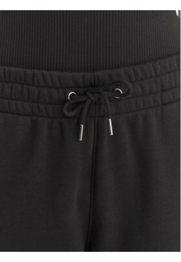 Under Armour Spodnie dresowe UA Icon Fleece 6001537 Czarny Slim Fit. Kolor: czarny. Materiał: bawełna