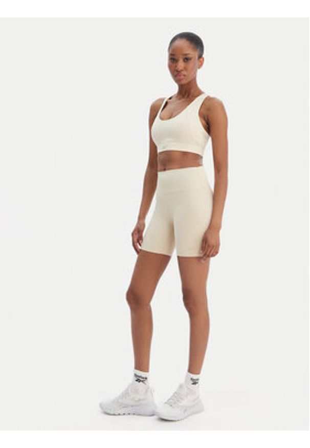 Reebok Szorty sportowe Reebok x Ewa Chodakowska RK25618CCW Beżowy Slim Fit. Kolor: beżowy. Materiał: syntetyk