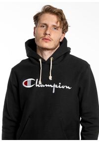 Bluza Champion Premium Script Logo Reverse Weave Hoodie (215159-KK001). Kolor: czarny. Materiał: materiał. Styl: elegancki, sportowy