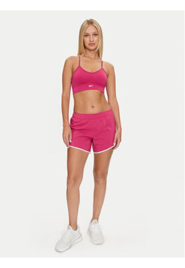 Reebok Szorty sportowe Id Train Woven Short 100035795 Różowy Regular Fit. Kolor: różowy. Materiał: syntetyk