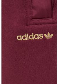 adidas Originals Spodnie męskie kolor fioletowy gładkie. Kolor: fioletowy. Materiał: bawełna, poliester. Wzór: gładki #4