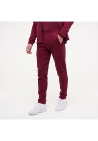 Spodnie dresowe męskie Puma Active Gym & Pilates. Kolor: czerwony. Materiał: dresówka. Sport: joga i pilates #1