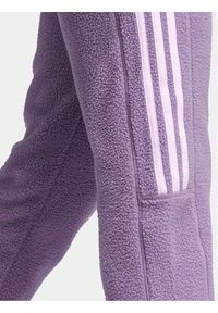 Adidas - adidas Spodnie dresowe Tiro Fleece IJ8415 Fioletowy Regular Fit. Kolor: fioletowy. Materiał: dresówka, syntetyk