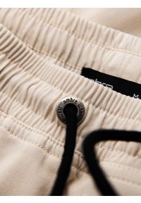 Ombre Clothing - Dzianinowe męskie joggery z kieszeniami cargo – kremowe V1 - Rozmiar: XL. Okazja: na co dzień. Kolor: kremowy. Materiał: dzianina. Wzór: aplikacja. Styl: casual #7