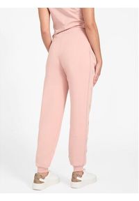Guess Spodnie materiałowe 179778 Różowy Slim Fit. Kolor: różowy. Materiał: materiał #5