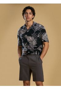 Sinsay - Szorty slim - niebieski. Kolor: niebieski #1