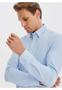 Pako Lorente - PAKO LORENTE – Niebieska dzianinowa koszula męska. Typ kołnierza: kołnierzyk klasyczny. Kolor: niebieski, biały, czarny. Materiał: dzianina. Długość rękawa: długi rękaw. Długość: długie. Wzór: gładki. Styl: klasyczny #4