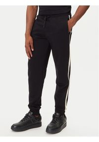 EA7 Emporio Armani Spodnie dresowe 7M000974 AF10377 UC001 Czarny Regular Fit. Kolor: czarny. Materiał: bawełna #1
