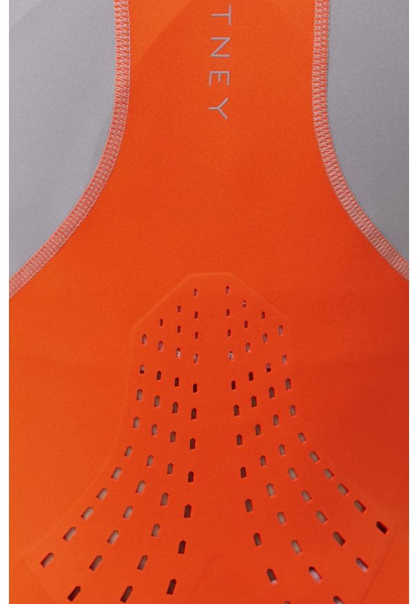 Adidas by Stella McCartney - adidas by Stella McCartney bluza treningowa Truepurpose damska kolor pomarańczowy wzorzysta. Okazja: na plażę. Kolor: pomarańczowy. Materiał: materiał, skóra, dzianina. Długość rękawa: raglanowy rękaw. Wzór: ze splotem, ażurowy