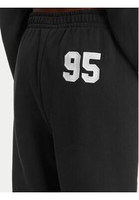 Juicy Couture Spodnie dresowe College JCSBJ126402 Czarny Relaxed Fit. Kolor: czarny. Materiał: bawełna #2