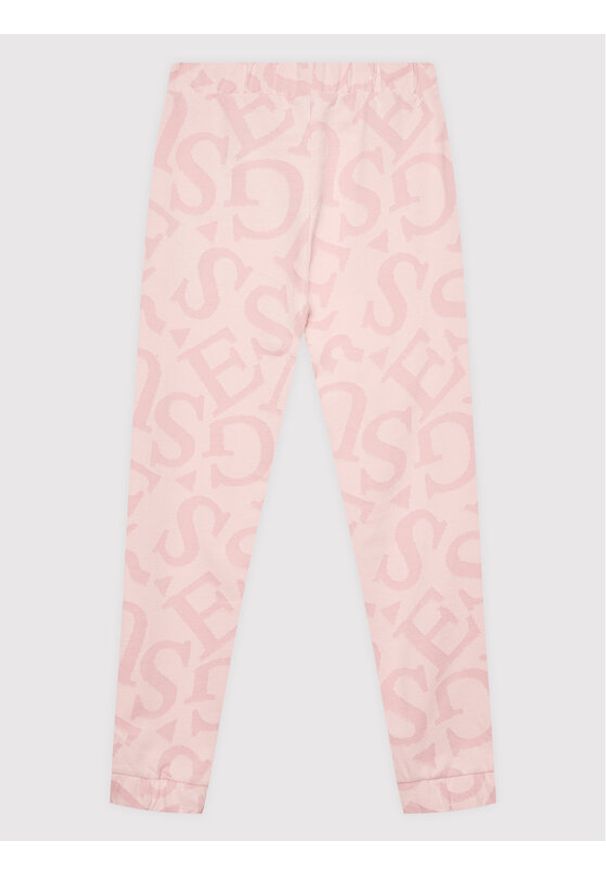 Guess Spodnie dresowe J2YQ12 KB8K3 Różowy Relaxed Fit. Kolor: różowy. Materiał: bawełna