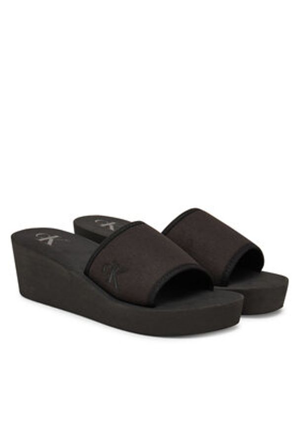 Calvin Klein Jeans Klapki Beach Wedge Slide Canvas YW0YW01725 Czarny. Kolor: czarny. Materiał: materiał