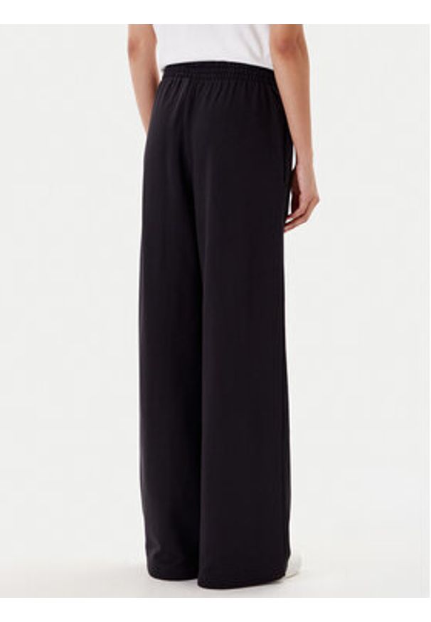 Adidas - adidas Spodnie dresowe Essentials JW2812 Czarny Wide Leg. Kolor: czarny. Materiał: bawełna