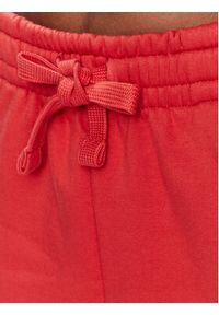 outhorn - Outhorn Spodnie dresowe TTROF178 Czerwony Relaxed Fit. Kolor: czerwony. Materiał: dresówka, bawełna